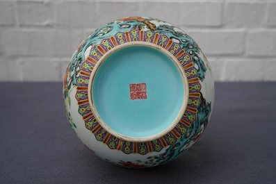 A Chinese famille rose bottle vase with floral design, Jiaqing mark, 19/20th C.